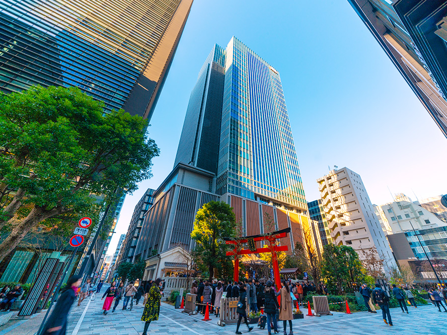 Modern Tokyo skyscrapers viewed from below at dusk